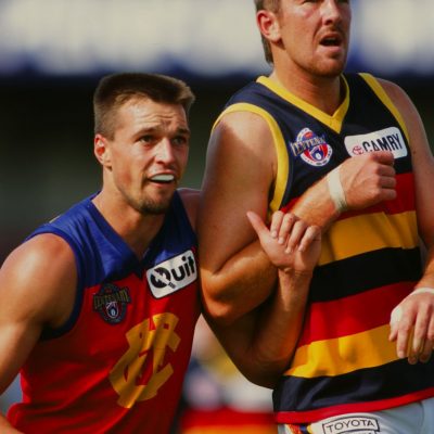 Brett Cook of Fitzroy and Shaun Rehn of the Crows push for position during the 1996 round 2 AFL match between the Adelaide Crows and Fitzroy.