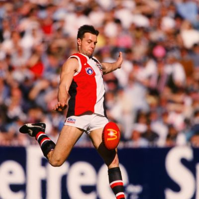 Brett Cook of the Saints takes a kick during the 1998 round 20 AFL match between the Carlton Blues and the St Kilda Saints.