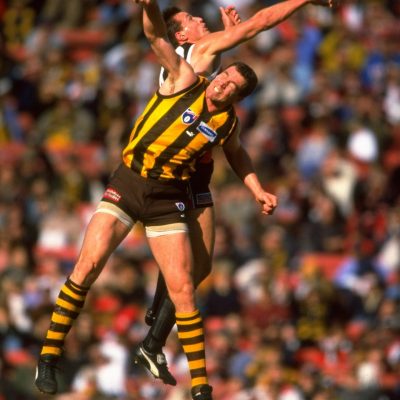 Paul Salmon of Hawthorn is challenged by Brett Cook of St Kilda during the 1998 round four AFL match between the Hawthorn Hawks and the St Kilda Saints at Waverley Park in Melbourne.